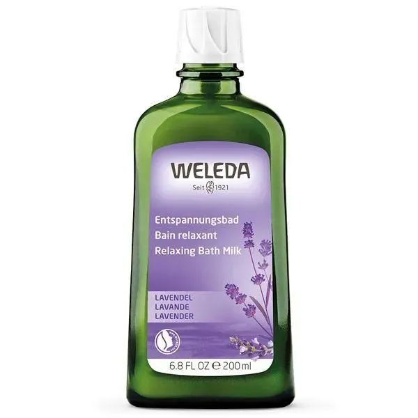 Green glass bottle of Weleda Relaxing Bath Milk with lavender, 200ml, with purple label and lavender illustrations.